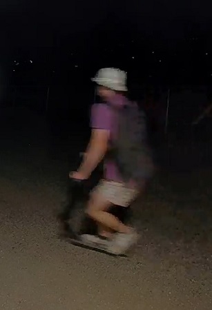 photo of male suspect on scooter