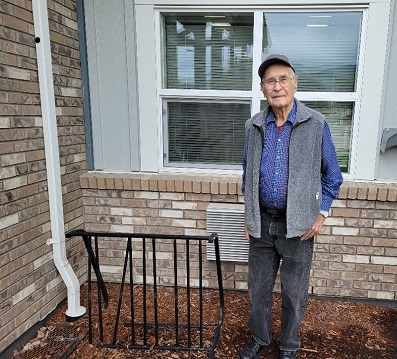 Willard Trainor next to bike rack