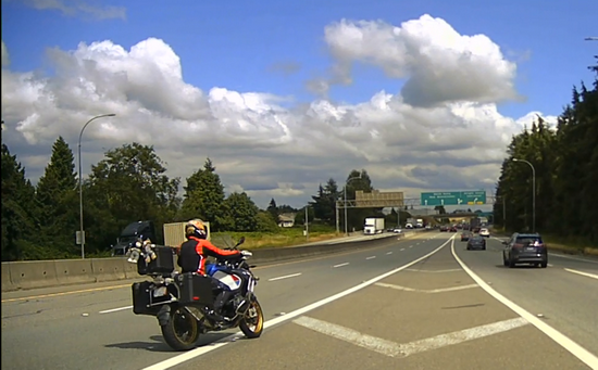 image of motorcyclist crossing meridian on hwy 91