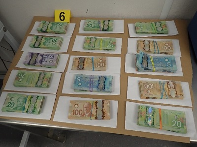 Canadian currency seized by police