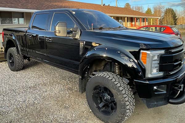 Side profile of stolen black truck