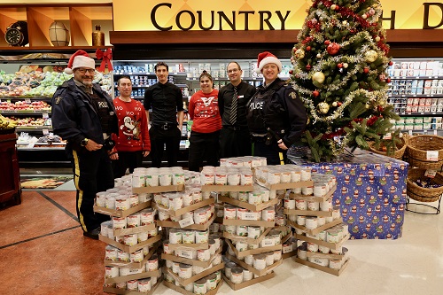 Community Policing and View Royal Quality Foods Teams up to Donate 52 Cases of Soup for Seniors in Need