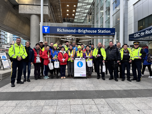 Richmond RCMP officers, volunteers, and partner agencies standing together