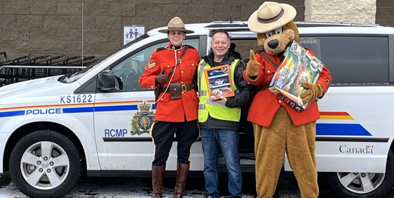 B.C. RCMP - Police cruiser stuffed with donations during annual toy drive