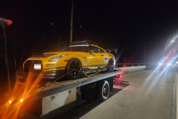 A Nissan GT-R is towed to an impound lot on Vancouver Island after its driver was ticketed for excessive speed