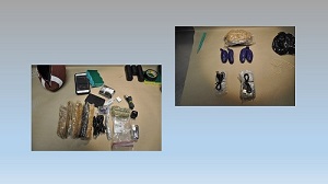 Photo of marihuana, tobacco, and items consistent with smuggling.