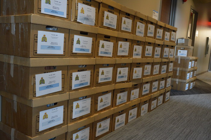 Image of approximately 60 banker boxes full of documents obtained or created during this investigation.