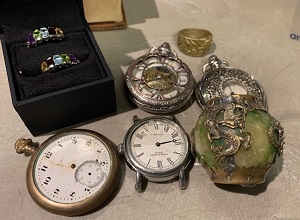 Photo of watches and rings.