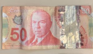 Photo of a counterfeit $50 bill.
