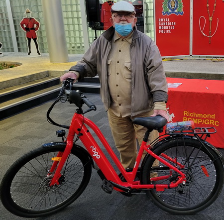 Man with e-bicycle