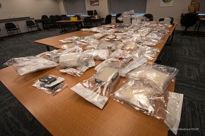 Table holding a very large quantity of suspeted illegal drugs
