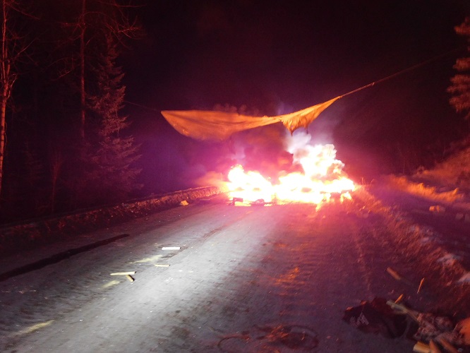 Photo 2 of tarp on fire