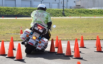 RCMP motorcycle and rider on skills course
