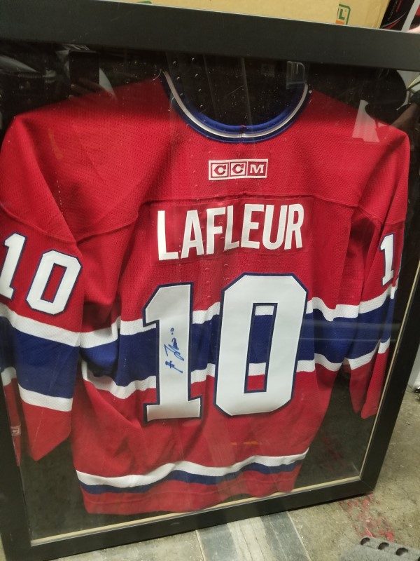 shadow box of an autographed Guy Lafleur Montreal Canadians jersey