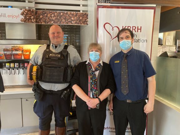 Cst Ryder Heim with two employees from the McDonalds restaurant