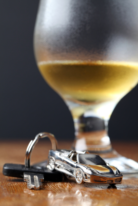 Photo of car keys and a glass of beer