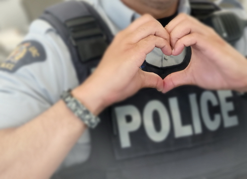 Photo - member making a hand heart