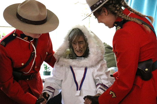 Annie in her ceremonial dress with RCMP