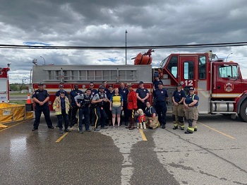 Charlie Lake Fire truck with firefighters and Cops for Cancer team riders