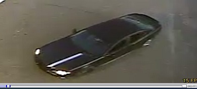 Overhead view of suspect vehicle showing white stripe