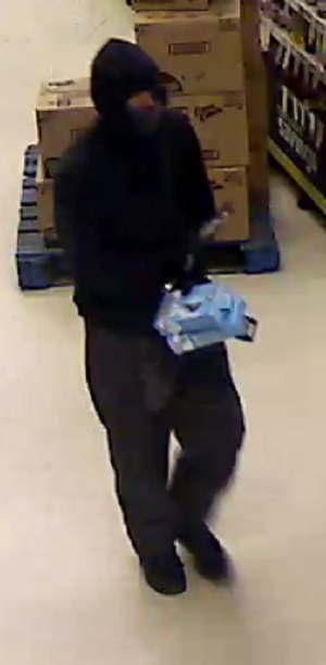 Suspect carrying boxes