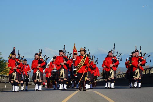 E Division Pipes and Drums band marching