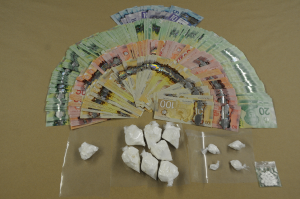 Suspected drugs and money that were seized during the search warrant