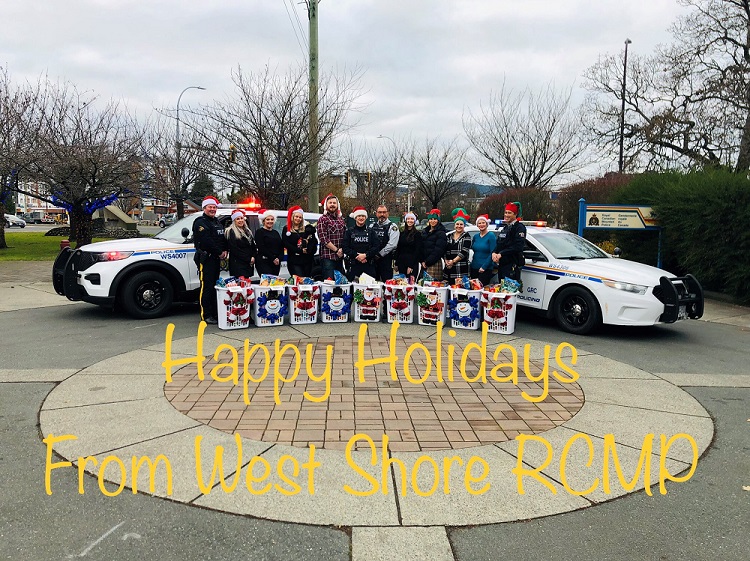 Photo of West Shore RCMP with Holiday Hampers