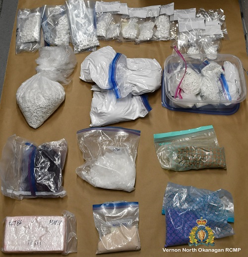 photo of bags of seized drugs and pills