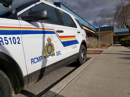 MR5102 police ford explorer parked outside of the Merritt RCMP Detachment.