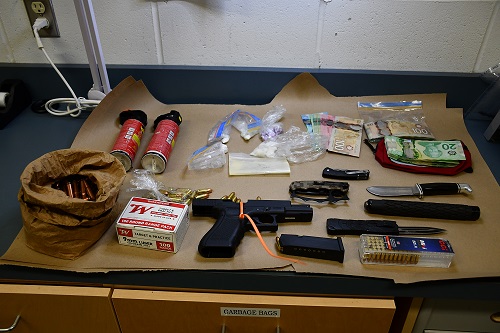 Cash, drug and weapons seized from Ebert Rd Home