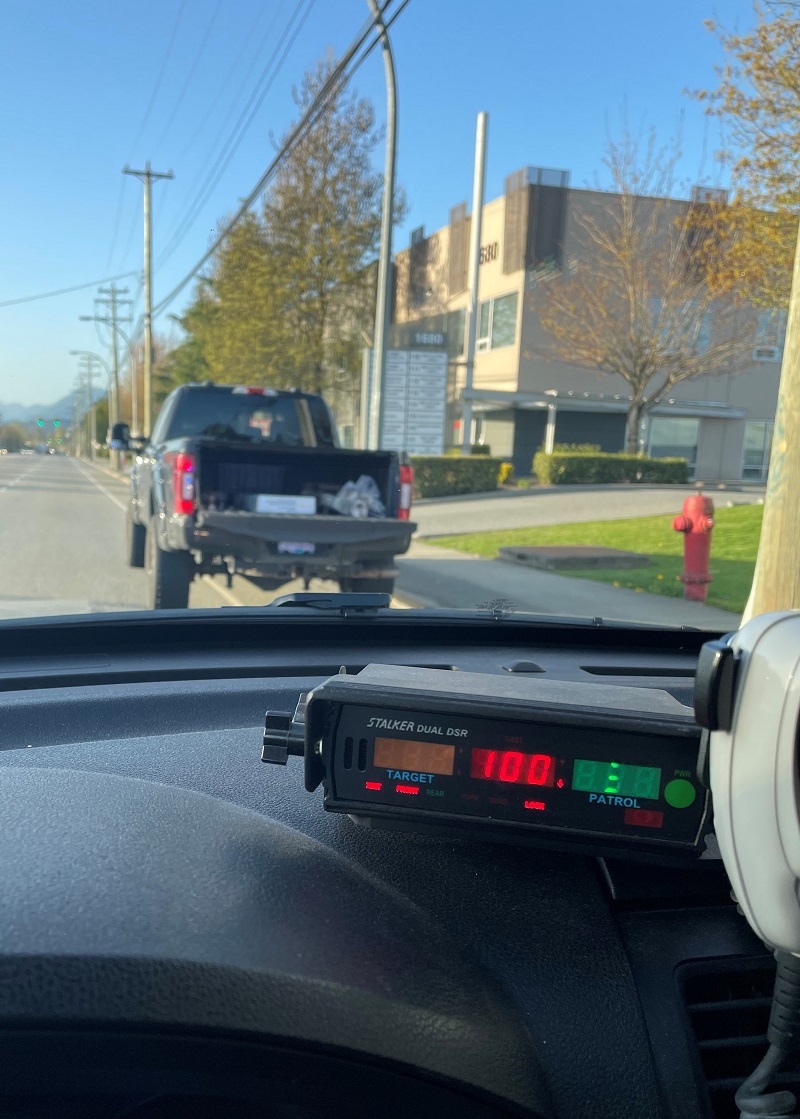Black pick-up truck pulled over for driving 100 km/hr in a 70 km/hr zone along the Maryhill Bypass in Port Coquitlam