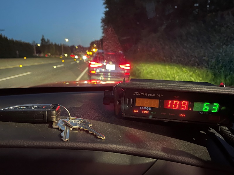 Police pull over a Black BMW for travelling 112 km/hr in a 60 km/hr zone along Maryhill Bypass at Pitt River Road in Port Coquitlam
