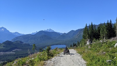 Photo of police ATV patrolling Forest Service Road