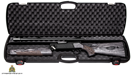 Photo of a disassembled hunting rifle in a locking plastic case
