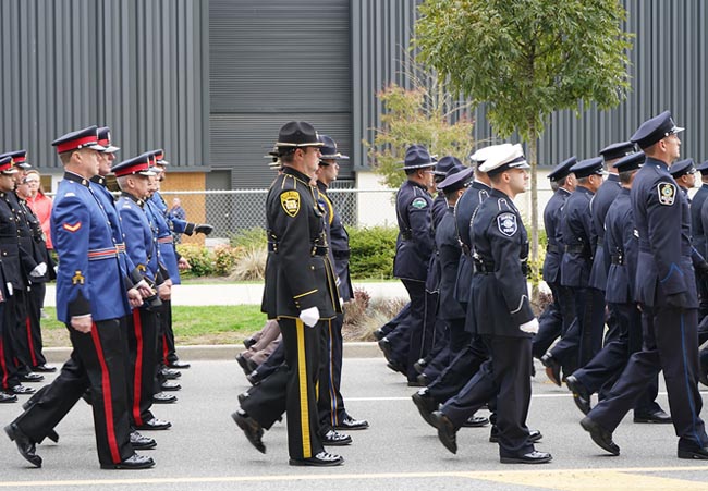 Policing partners marching