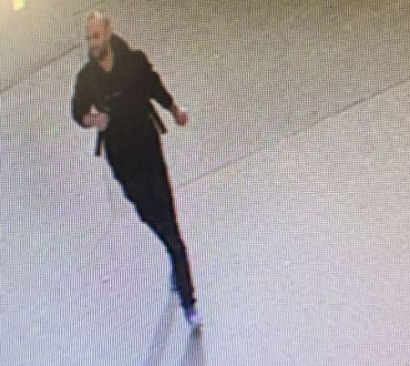 The suspect is described as: Caucasian male, shaved head, trimmed beard.