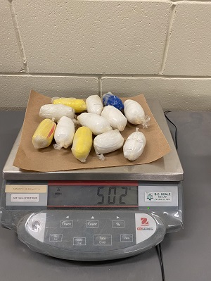 Photo of cocaine packages on a scale