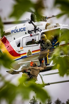 Photo of a helicopter used to hoist Emergency Response Team officers during a training exercise