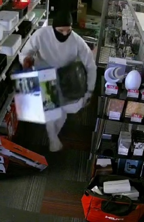break-in suspect in white clothing 