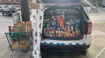 Police car filled with donated goods